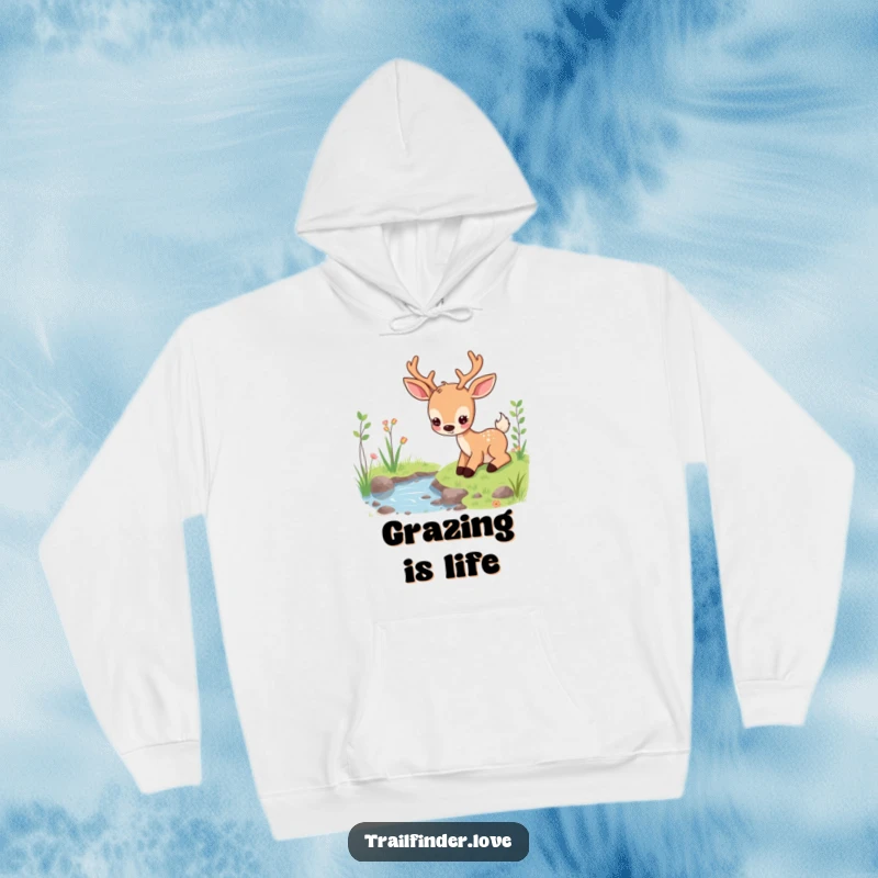 Funny hoodie depicting a content deer character peacefully grazing near a stream, offering warmth and tranquility, ideal funny gift.