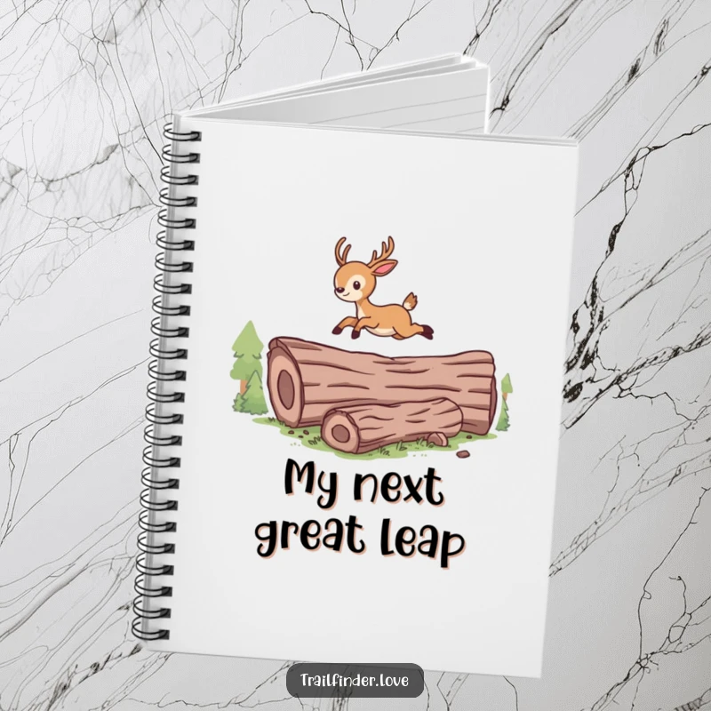 Funny notebook with an energetic deer character leaping over a log, ideal for capturing inspired thoughts.